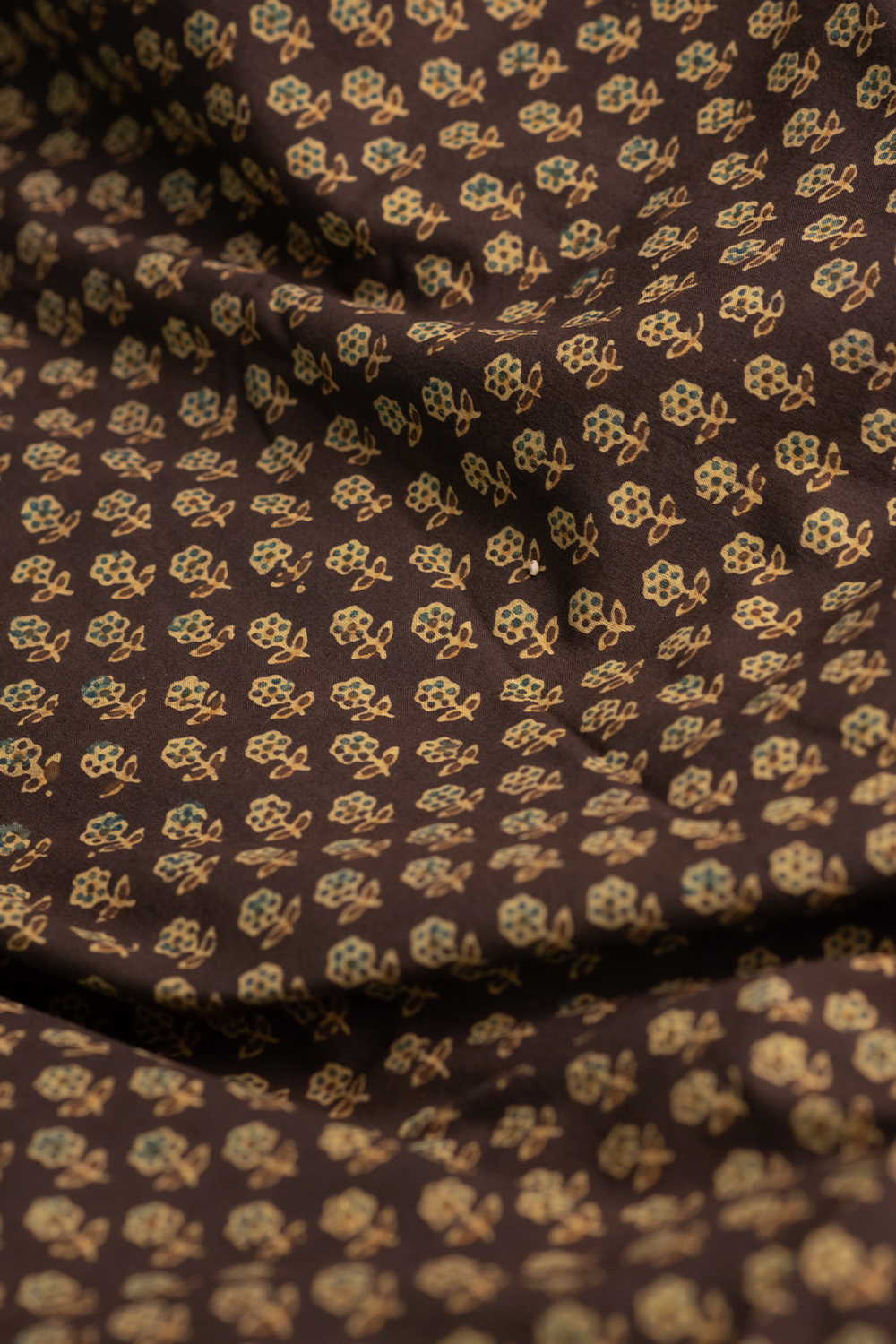 Small Buttas on Brown Ajrak Cotton Fabric - Image 3