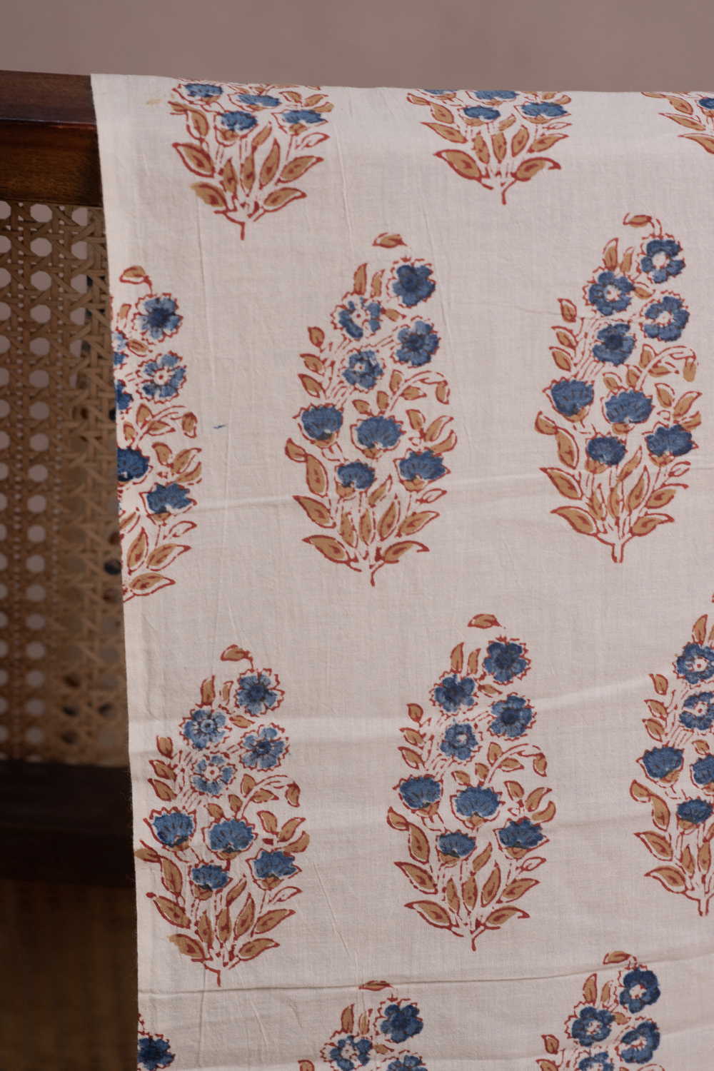 Buttas on Cream Ajrak Cotton Fabric