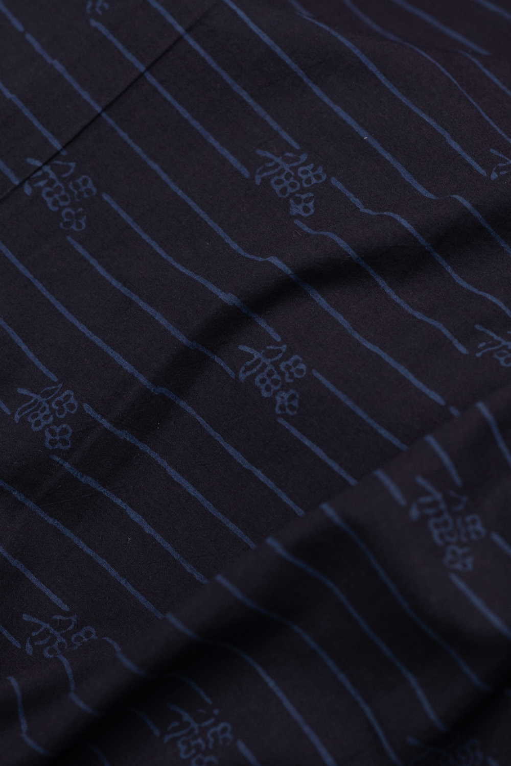 Indigo Lines on Black Ajrak Cotton Fabric - Image 3