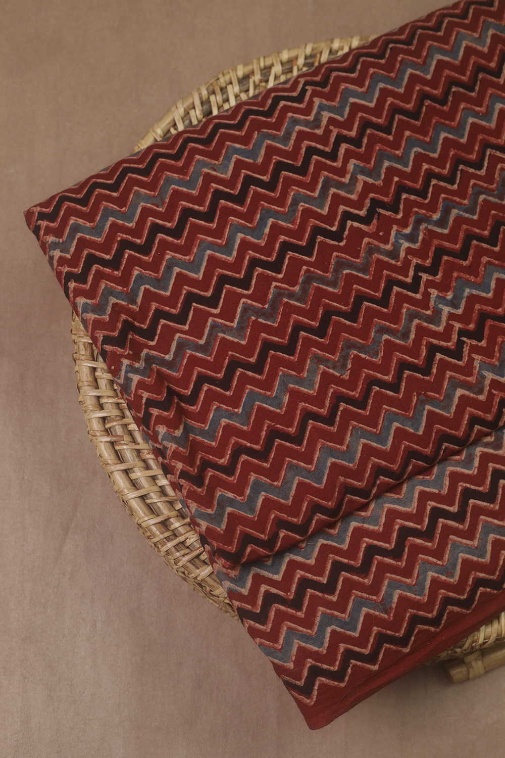 Zig Zag Patterns on Maroon Ajrak Cotton Fabric