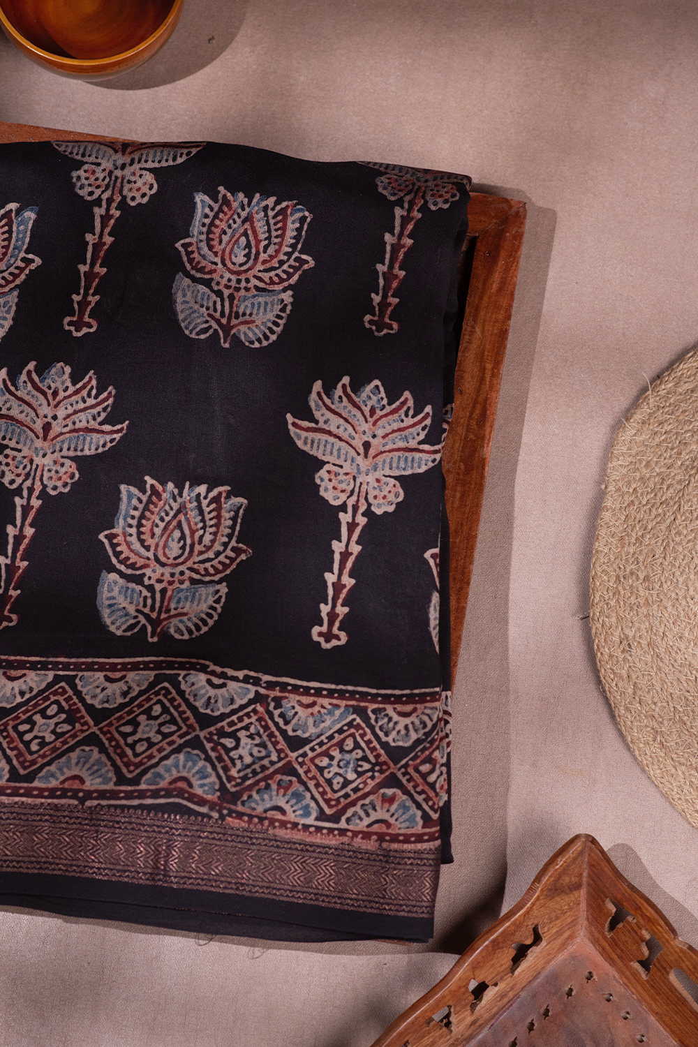Lotus Butta on Black Ajrak Maheshwari saree