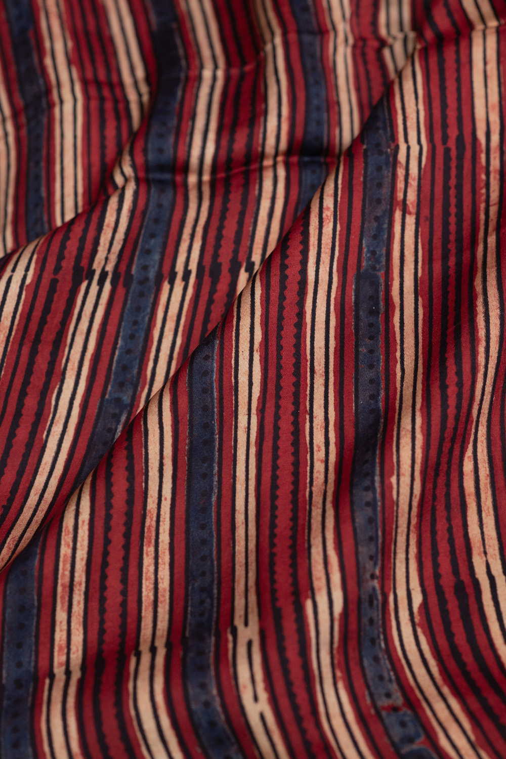 Lines on Maroon Ajrak Modal Silk Fabric - Image 3