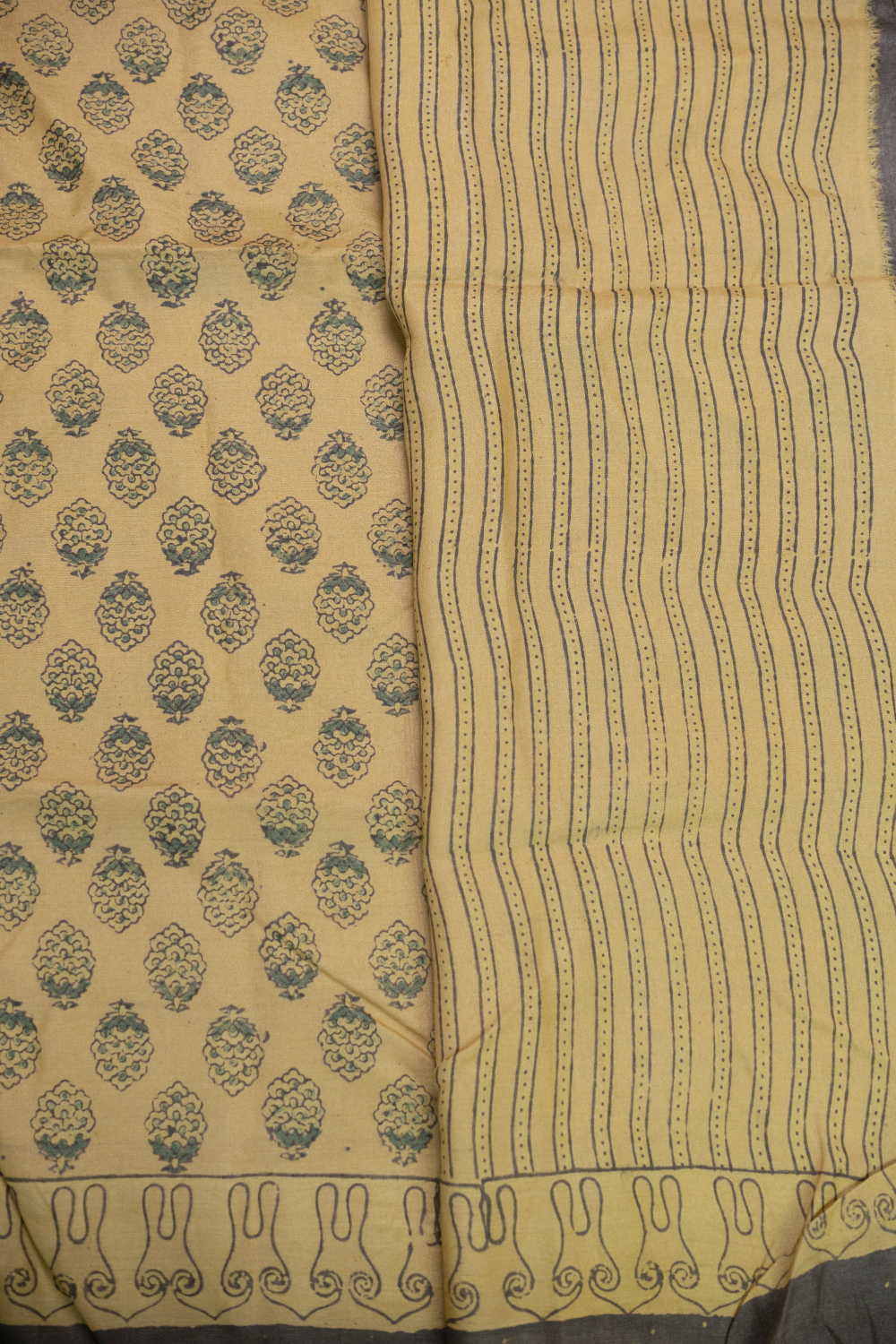 Buttas on Subtle yellow Ajrak Tussar Silk saree - Image 4