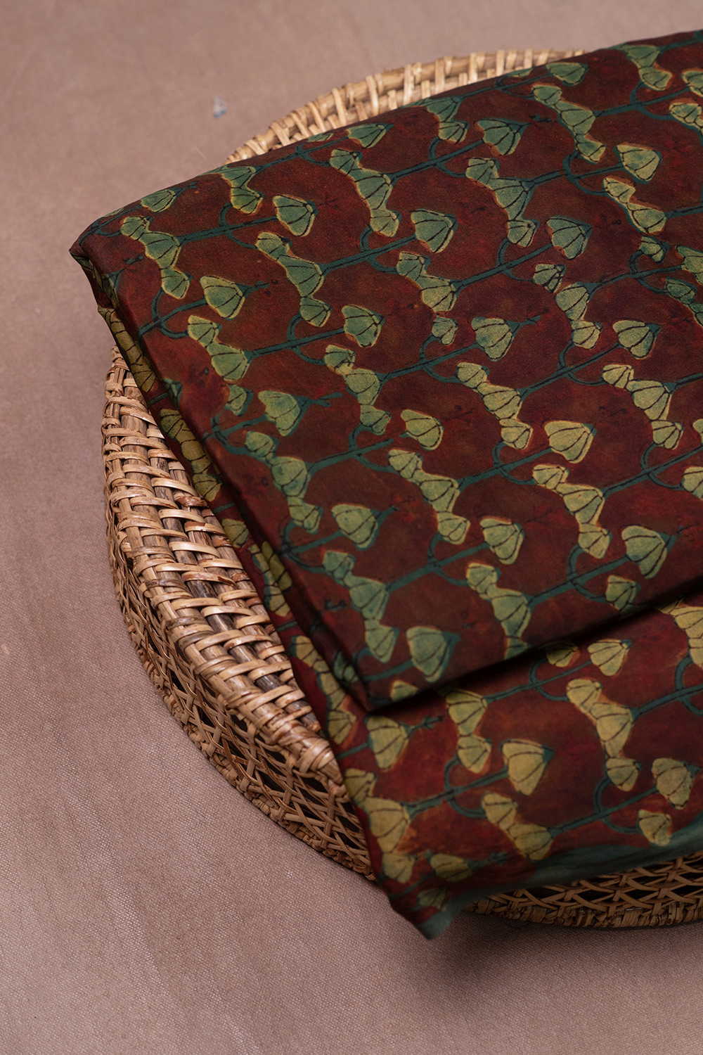 Motifs on Maroon Block Printed Modal Silk Fabric