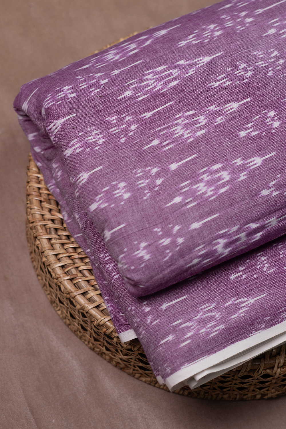 Cream Motifs on Purple Ikat Cotton Fabric