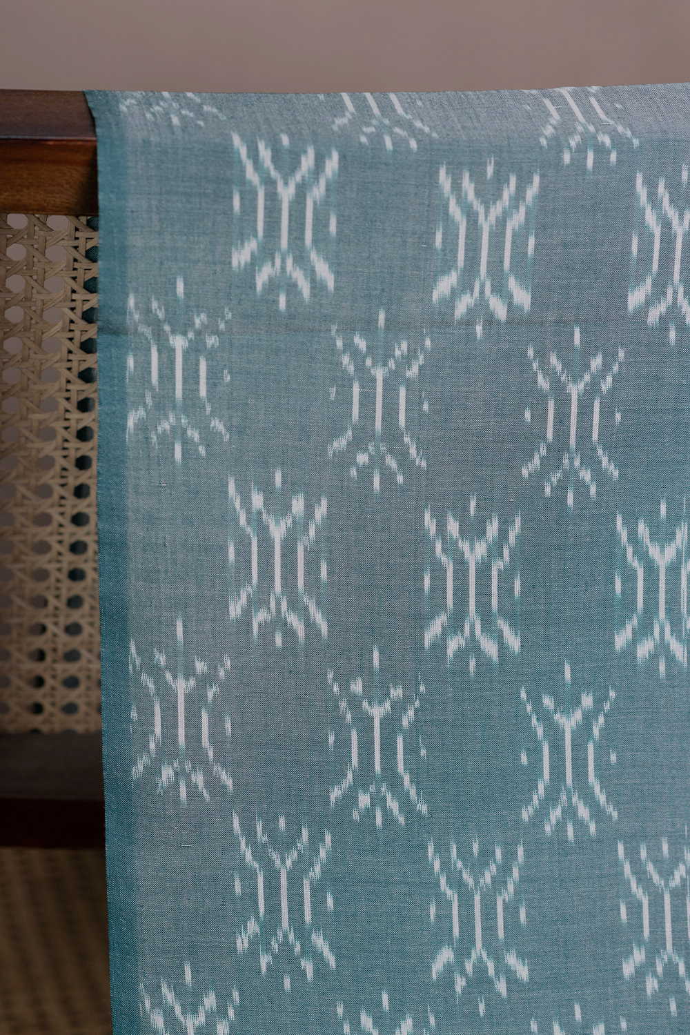 Buttas on Green Mercerized Ikat Cotton Fabric - Image 2