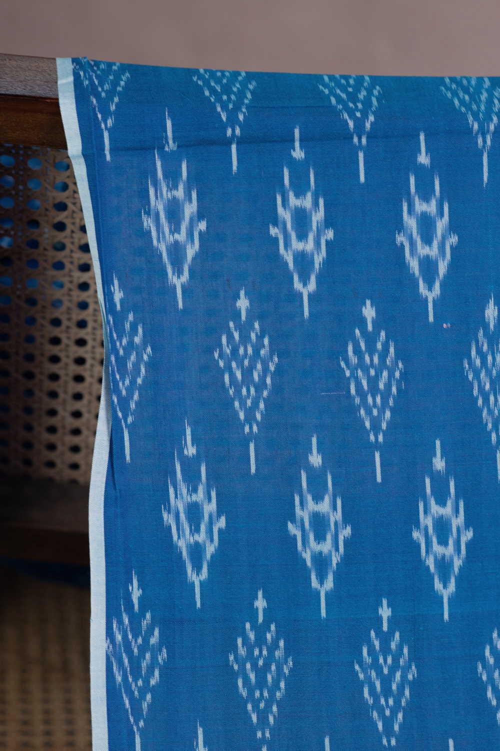 Cream Motifs on Blue Mercerized Ikat Cotton Fabric - Image 2