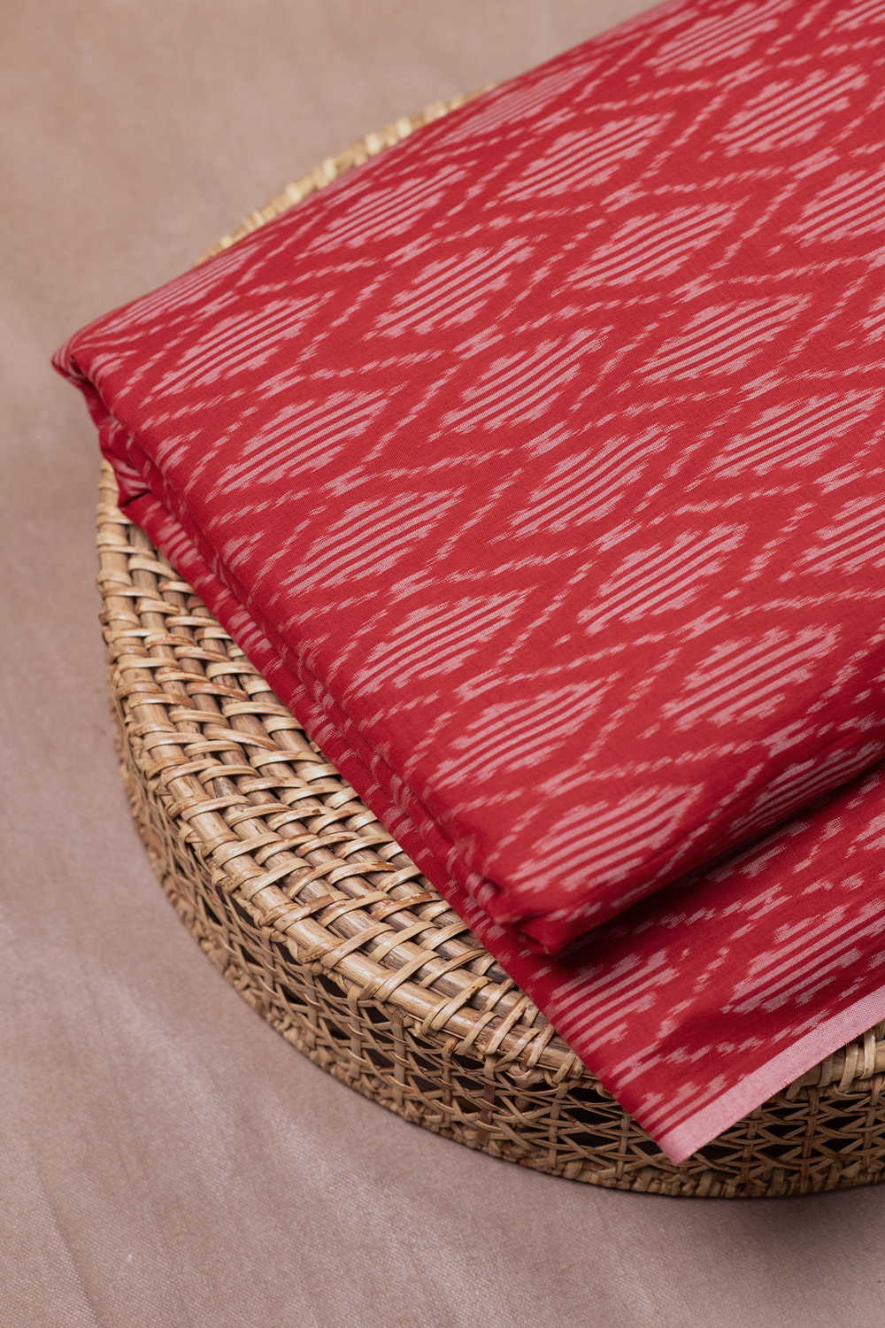 Diagonal Motifs on Red Mercerized Ikat Cotton Fabric
