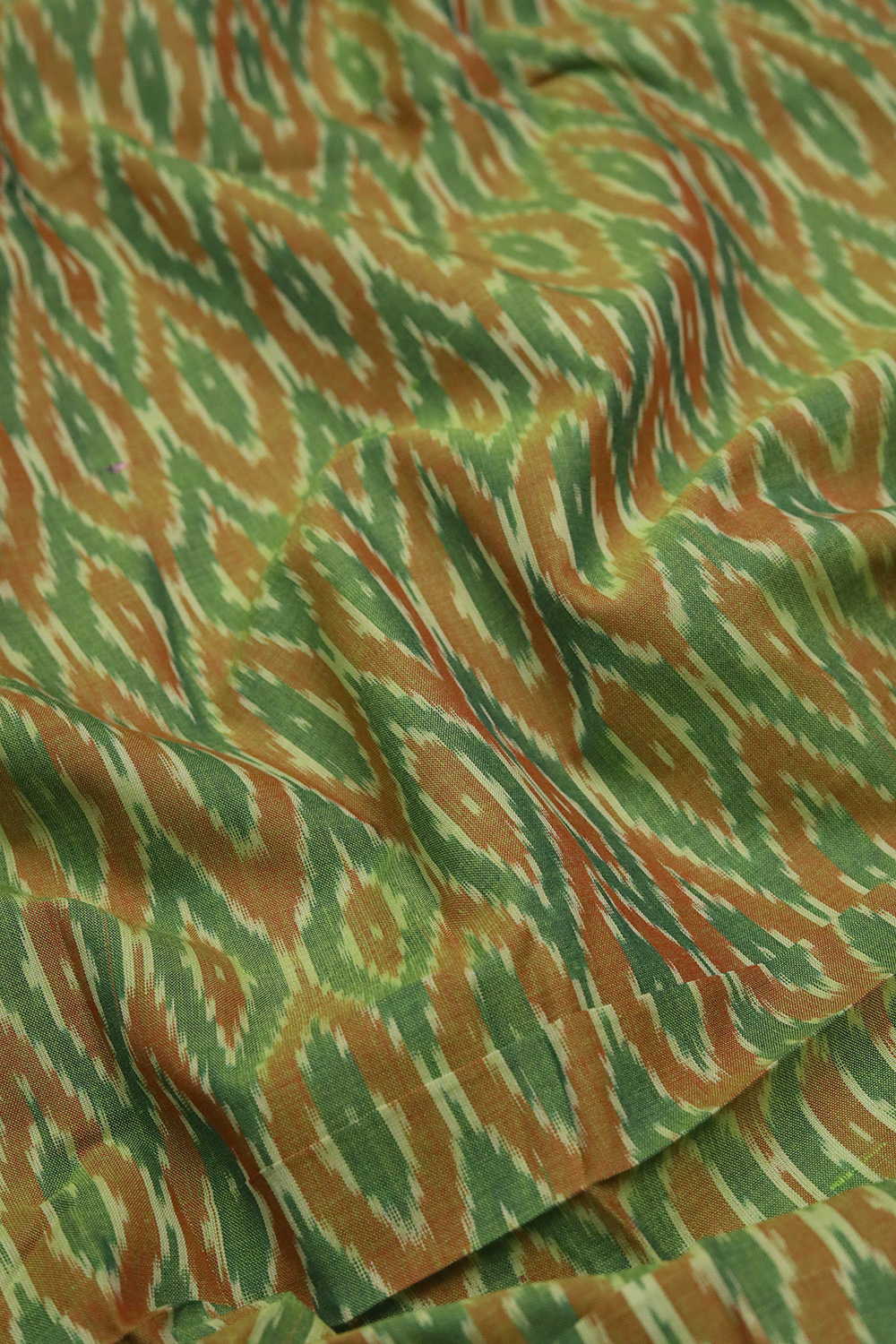 Patterned on Green Ikat Cotton Fabric - Image 2