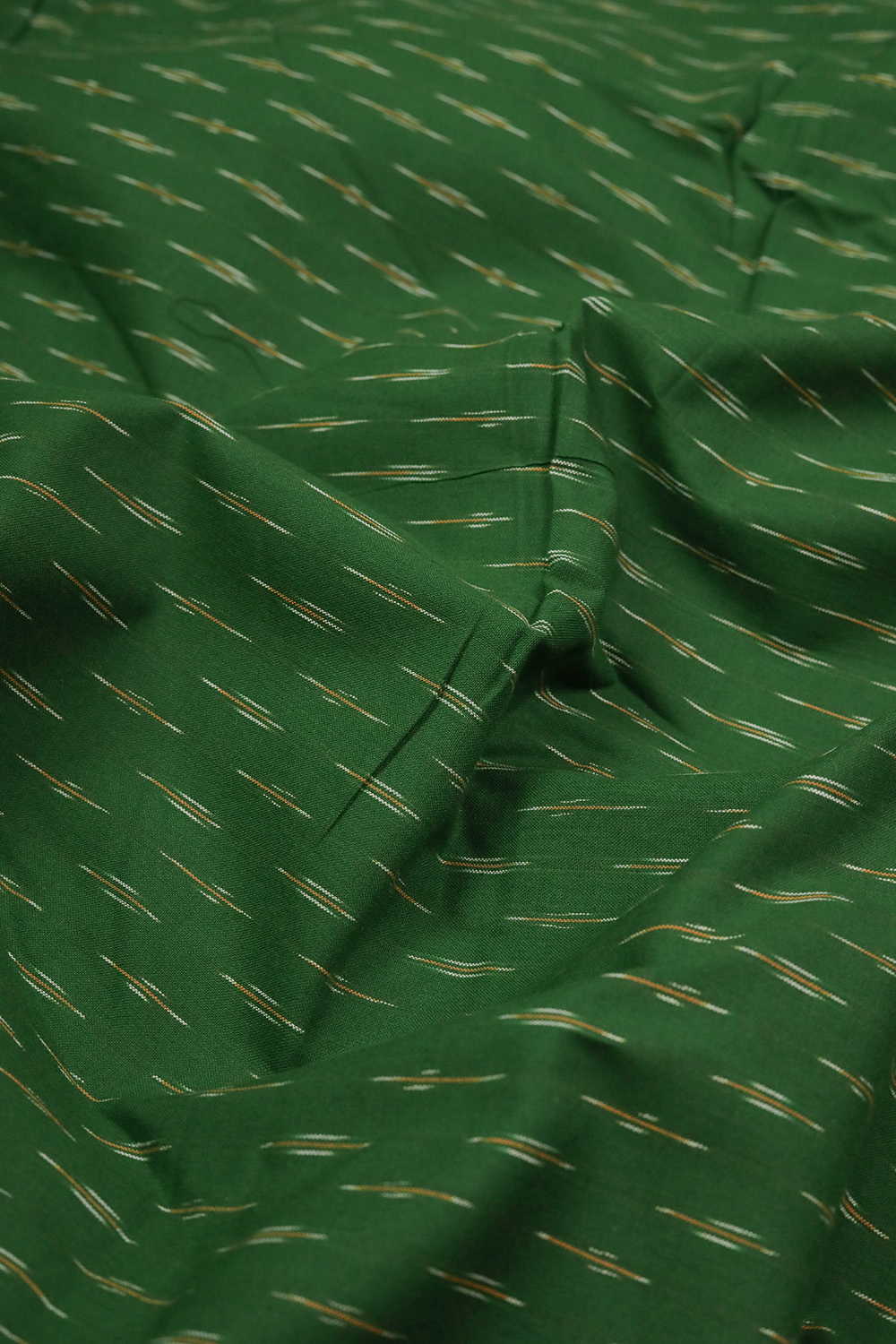 Dark Leaf Green Ikat Cotton Fabric - Image 3