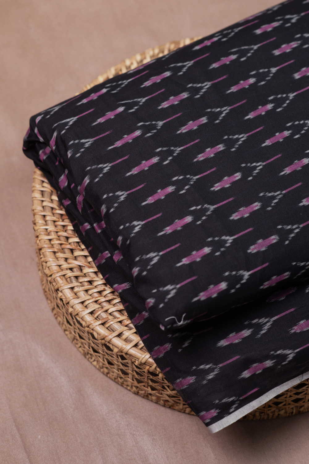 Motifs on Black Mercerized Ikat Cotton Fabric-2 m