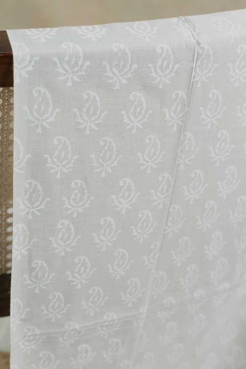 Paisley Butta on Cream Sanganeri Cotton Fabric - 1.1m